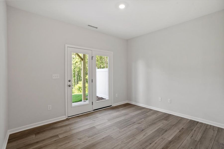 Spacious, unfurnished interior of a new home in Sweetbrier, Durham (Image 29).