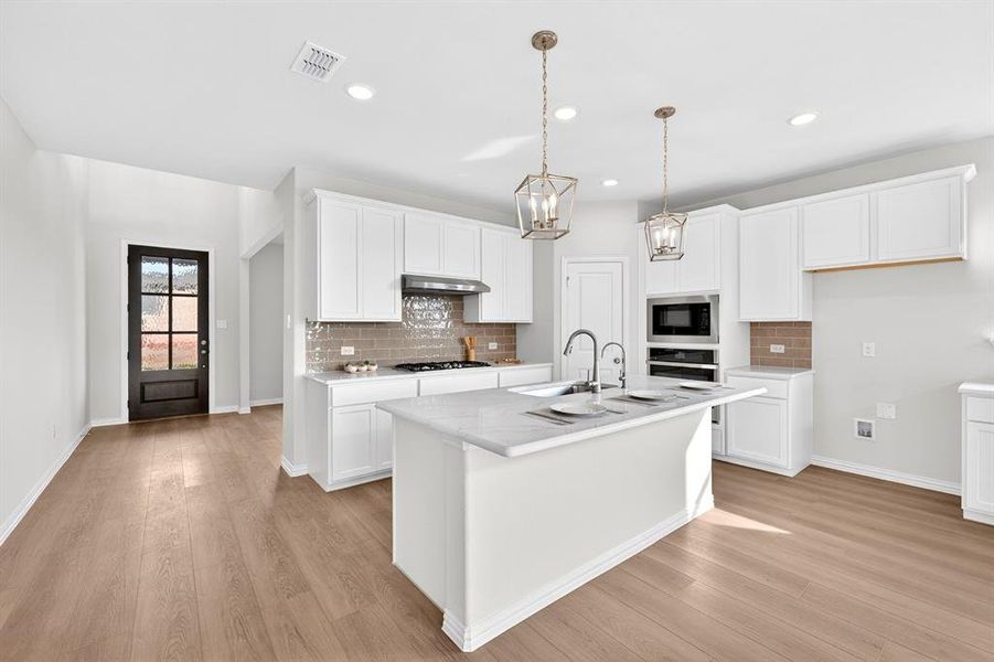 Furnished interior view inside a new home in Lily Creek at Sutton Fields, Aubrey (Image 10). Furnished interior view inside a new home in Lily Creek at Sutton Fields, Aubrey (Image 10).