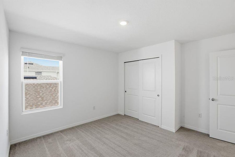 Spacious, unfurnished interior of a new home in Waterstone, Groveland (Image 41).