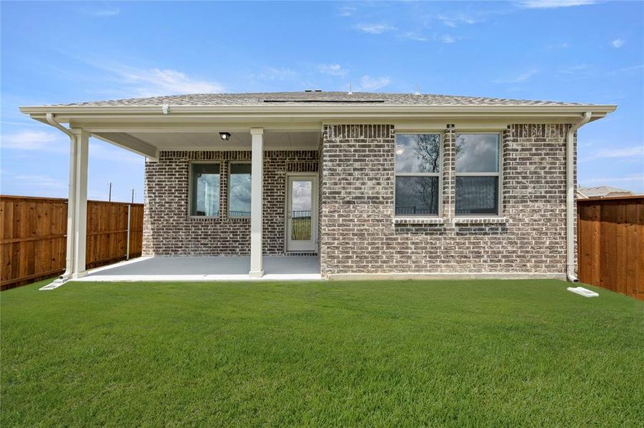 Front exterior of a new home in Creekview Fossil Ridge, Pilot Point, TX, highlighting curb appeal (Image 18).