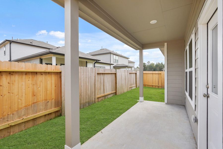 Exterior details and patio area of a home in Lakes at Black Oak, Magnolia (Image 3). Exterior details and patio area of a home in Lakes at Black Oak, Magnolia (Image 3).