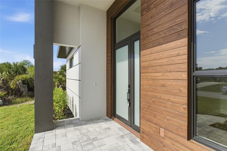 Exterior details and patio area of a home in , Port Charlotte (Image 24).