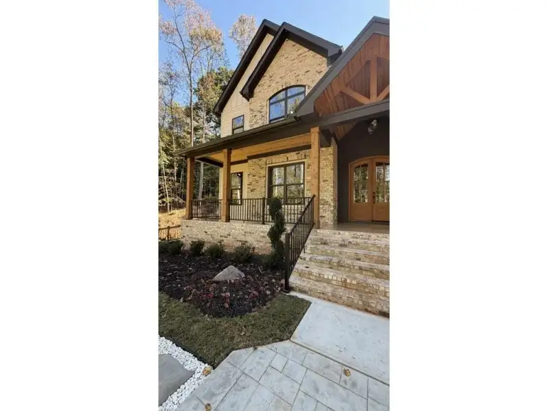 Exterior details and patio area of a home in , Hoschton (Image 25).