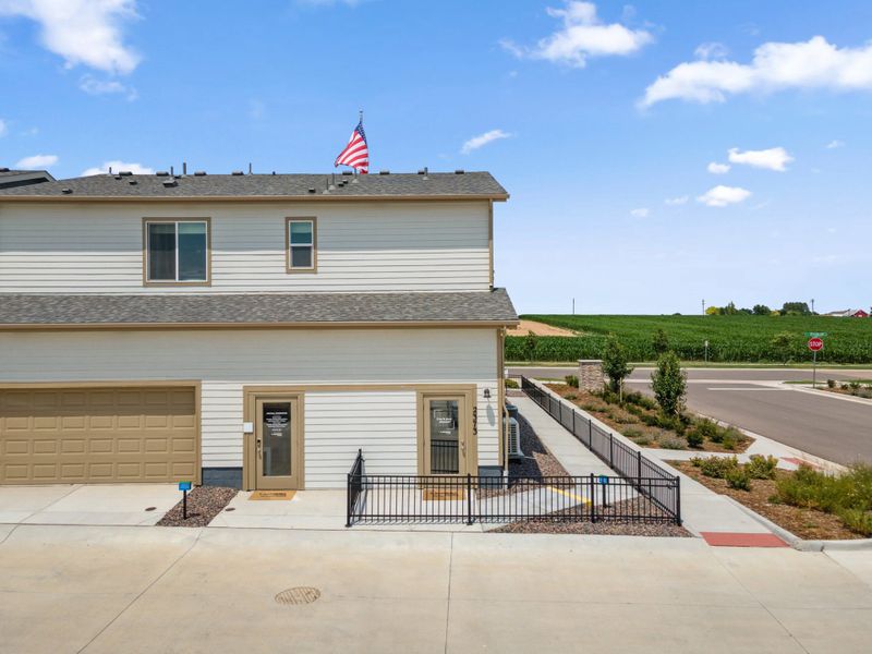 Representative exterior photo of a completed home built from the Biscayne by Landsea Homes in Pintail Commons at Johnstown Village, Johnstown, CO (Image 24).