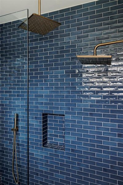 Bathroom view of a tile shower