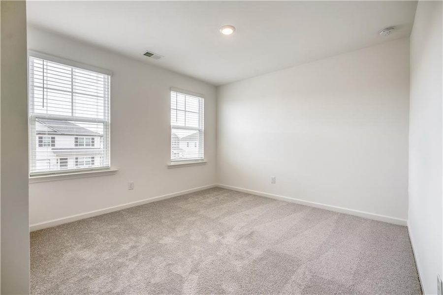 Spacious, unfurnished interior of a new home in Watson Farms, Loganville (Image 12). Spacious, unfurnished interior of a new home in Watson Farms, Loganville (Image 12).