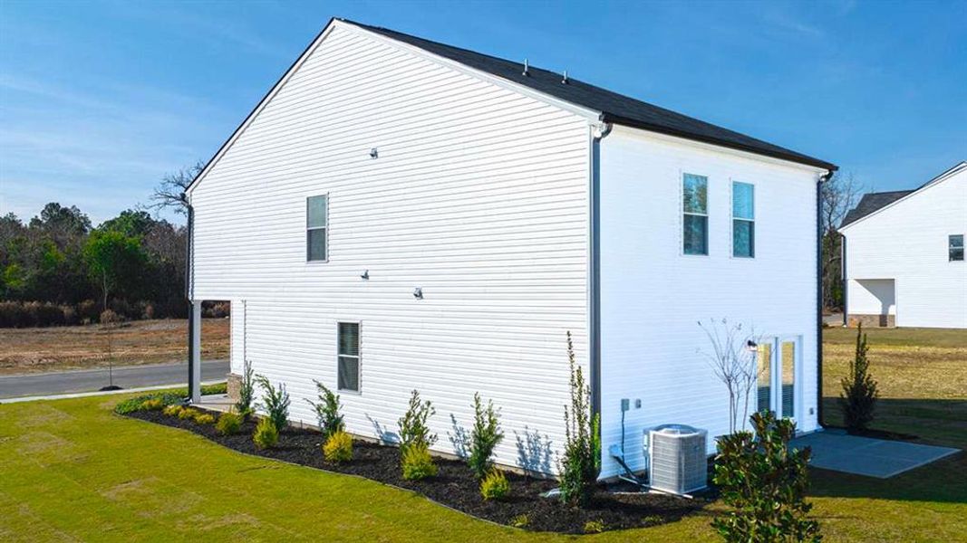 Front exterior of a new home in Shoal Creek, Hampton, GA, highlighting curb appeal (Image 21).