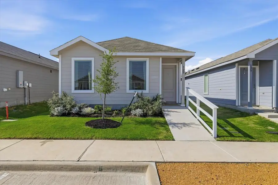 Front exterior of a new home in Tillage Farms, Princeton, TX, highlighting curb appeal (Image 1). Front exterior of a new home in Tillage Farms, Princeton, TX, highlighting curb appeal (Image 1).