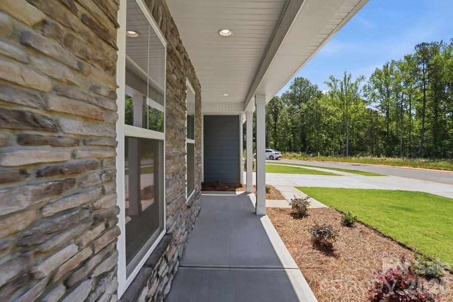 Exterior details and patio area of a home in Enclave at Riverdale, Huntersville (Image 3).