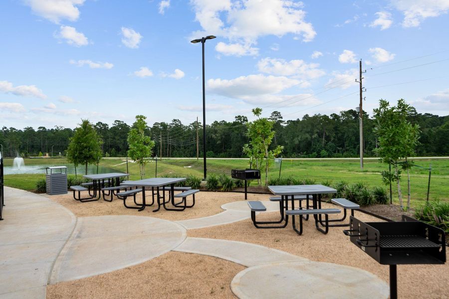 Adjacent to the pool, enjoy a shaded picnic area equipped with tables and seating, ideal for gatherings, barbecues, or simply unwinding with friends and family. Adjacent to the pool, enjoy a shaded picnic area equipped with tables and seating, ideal for gatherings, barbecues, or simply unwinding with friends and family.