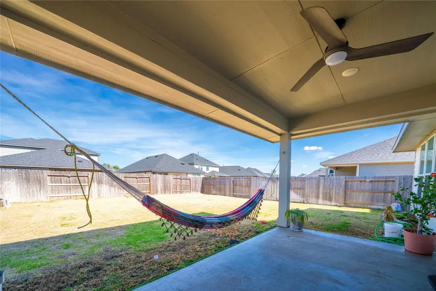 Exterior details and patio area of a home in Mason Woods, Cypress (Image 27). Exterior details and patio area of a home in Mason Woods, Cypress (Image 27).