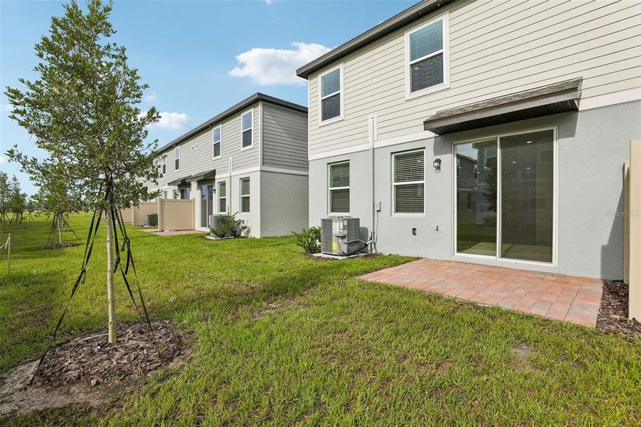 Exterior details and patio area of a home in The Meadow at Crossprairie Townes, St. Cloud (Image 3). Exterior details and patio area of a home in The Meadow at Crossprairie Townes, St. Cloud (Image 3).