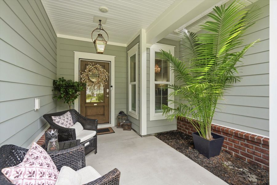 Exterior details and patio area of a home in , Johns Island (Image 4). Exterior details and patio area of a home in , Johns Island (Image 4).