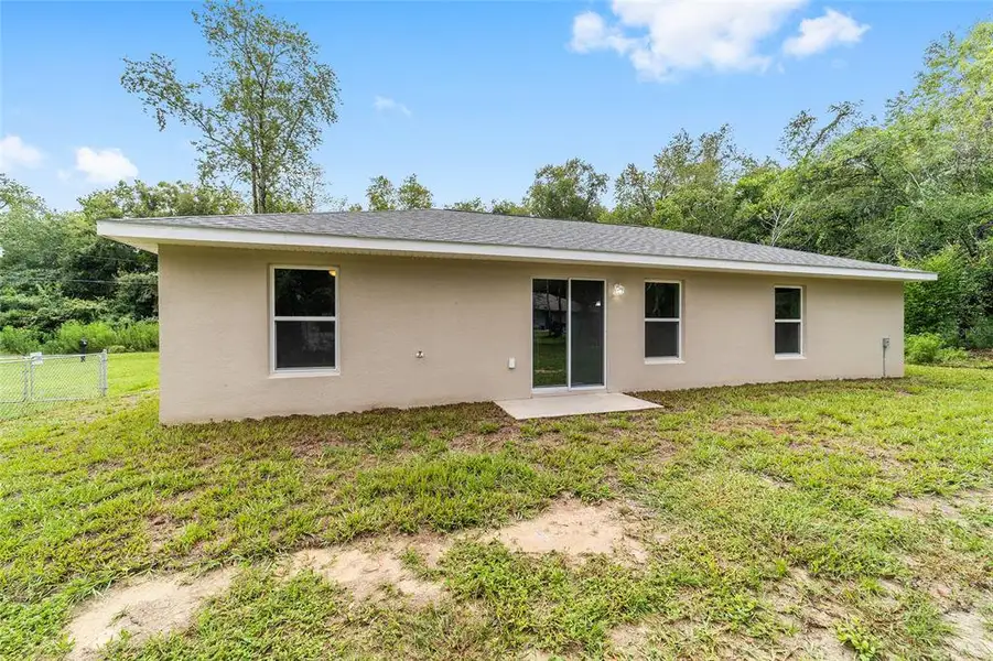 Exterior details and patio area of a home in , Ocala (Image 3).