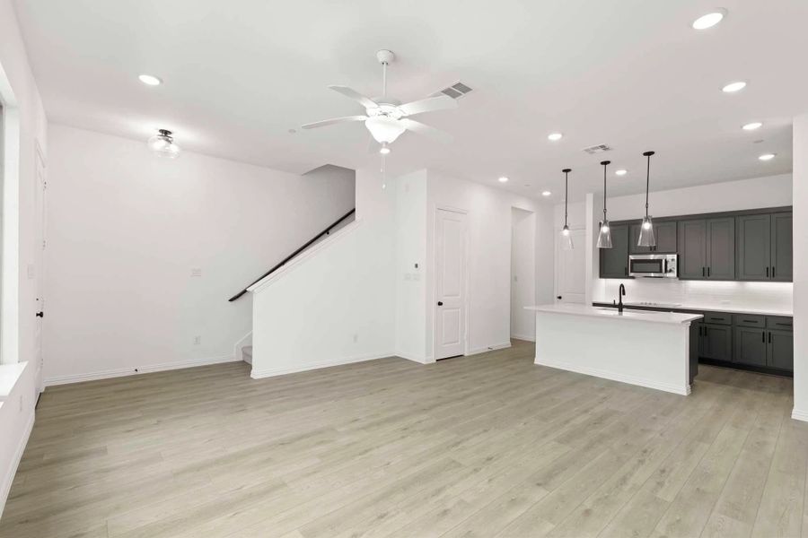 Open Kitchen-Living-Dining Room featuring the Minimalist Collection Open Kitchen-Living-Dining Room featuring the Minimalist Collection