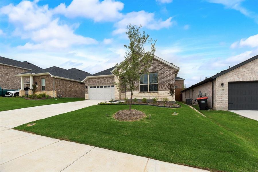 Front exterior of a new home in Villages of Hurricane Creek, Anna, TX, highlighting curb appeal (Image 19).