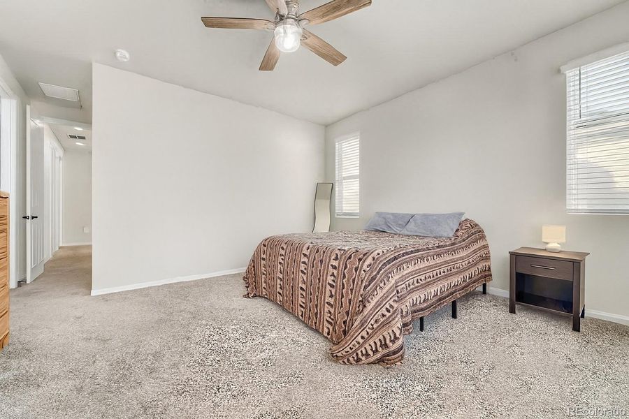 Furnished interior view inside a new home in Urban Collection at Copperleaf, Aurora (Image 13).