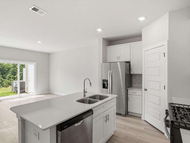 Furnished interior view inside a new home in Northbrook Village Townes, Taylors (Image 5). Furnished interior view inside a new home in Northbrook Village Townes, Taylors (Image 5).