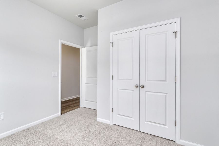 Spacious, unfurnished interior of a new home in Hainer Place, Conway (Image 24).