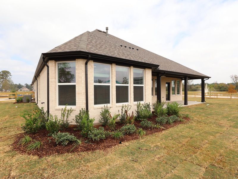 Exterior details and patio area of a home in Sorella, Tomball (Image 14). Exterior details and patio area of a home in Sorella, Tomball (Image 14).