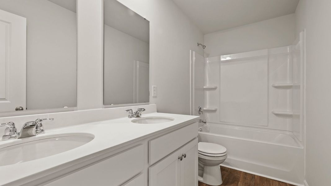 Furnished interior view inside a new home in Pine Hills Townhomes at Cane Bay, Summerville (Image 9).