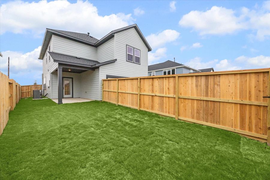 Exterior details and patio area of a home in Elyson, Katy (Image 21).
