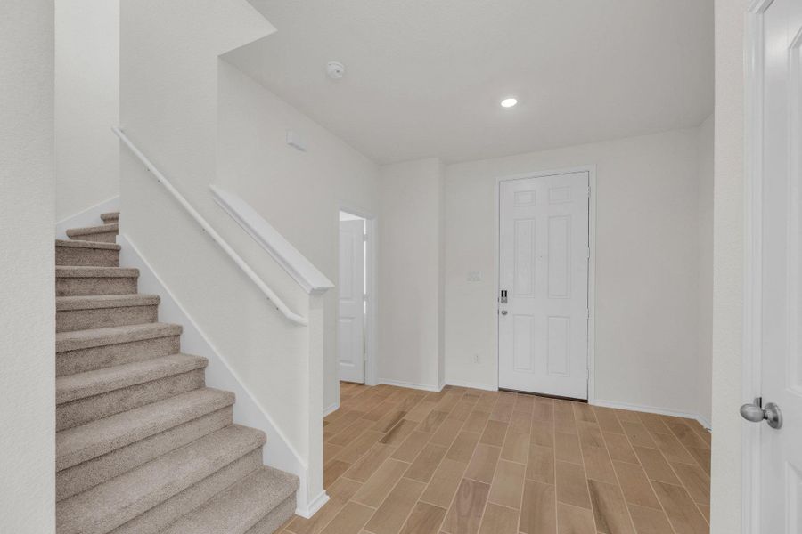 Spacious, unfurnished interior of a new home in Mustang Valley, Manor (Image 23).