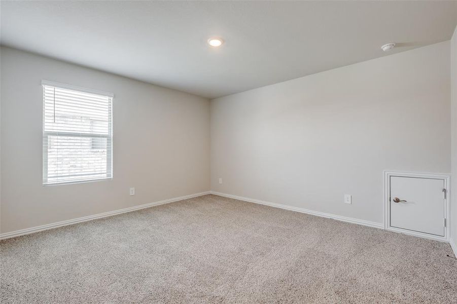 Unfurnished room featuring carpet flooring