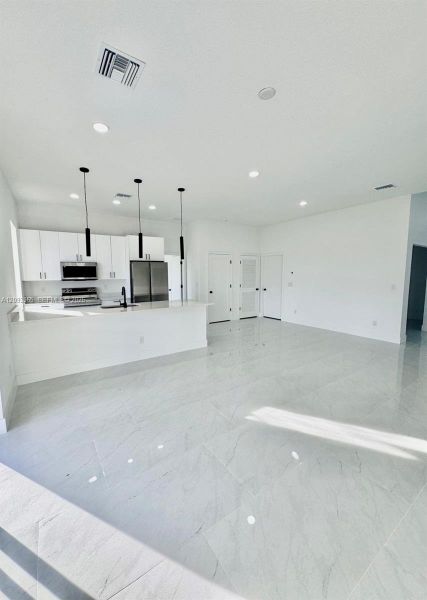 Spacious, unfurnished interior of a new home in , Lehigh Acres (Image 12). Spacious, unfurnished interior of a new home in , Lehigh Acres (Image 12).