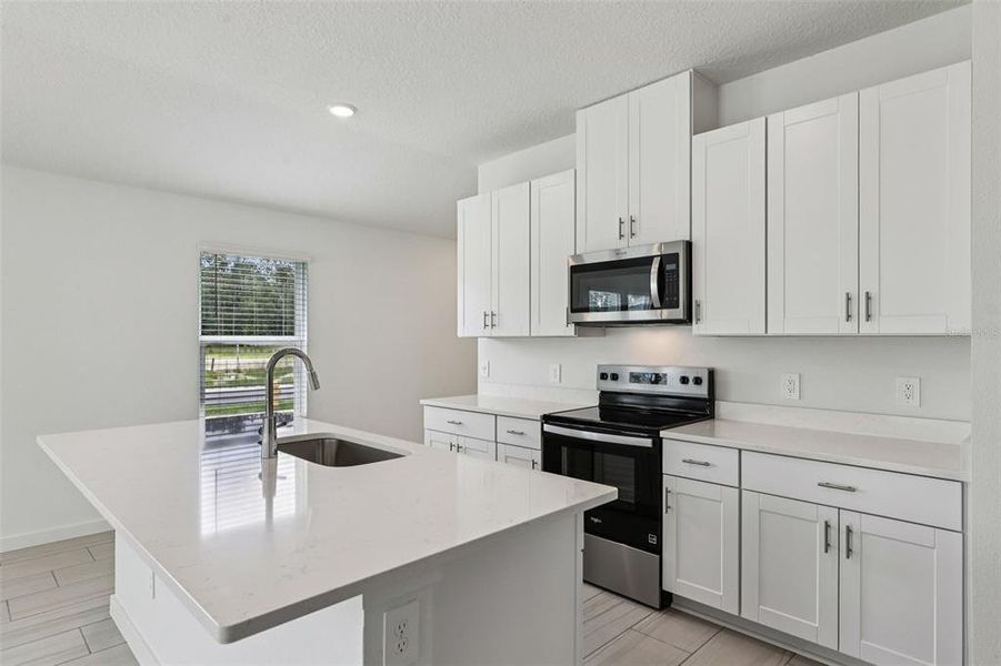 Furnished interior view inside a new home in Flagler Village - Classic Series, Palm Coast (Image 7).