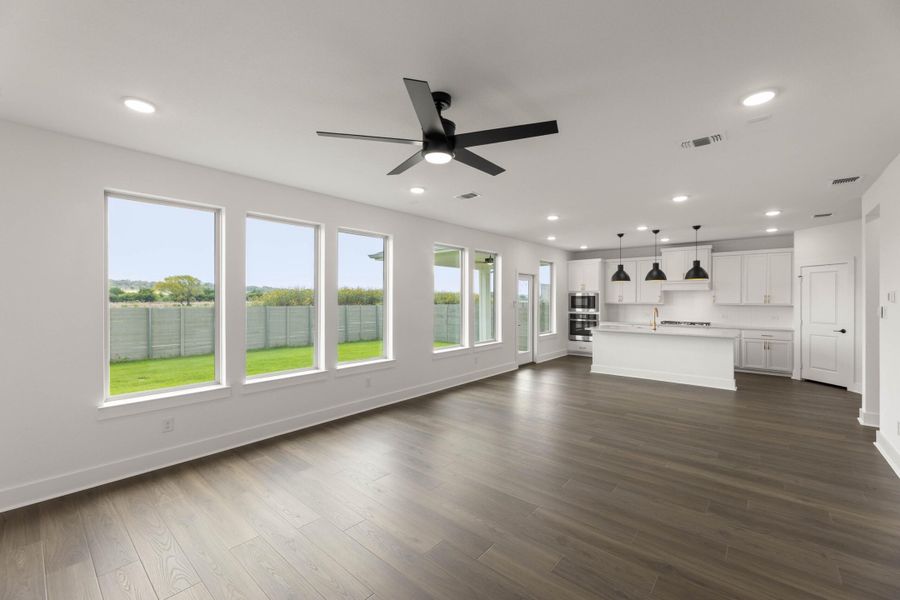 Spacious, unfurnished interior of a new home in Cottage Collection at Harvest, Argyle (Image 17).