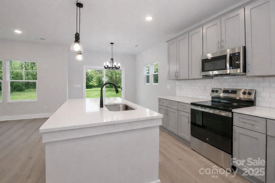 Furnished interior view inside a new home in , Statesville (Image 8).