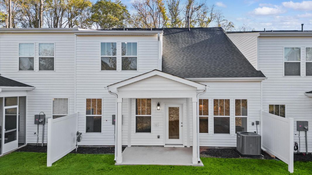 Exterior details and patio area of a home in Camden Cottages, Greenville (Image 4).