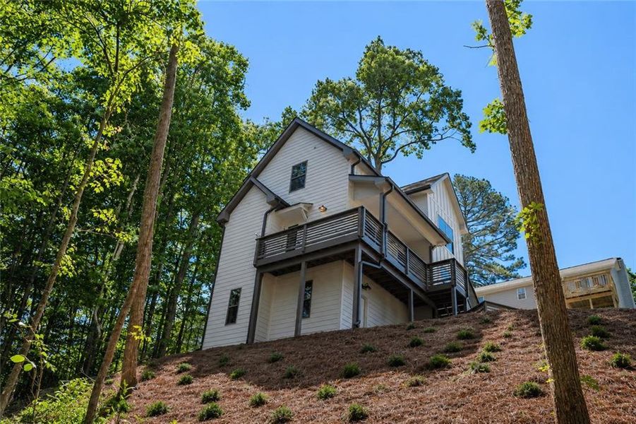 Front exterior of a new home in , Gainesville, GA, highlighting curb appeal (Image 2). Front exterior of a new home in , Gainesville, GA, highlighting curb appeal (Image 2).