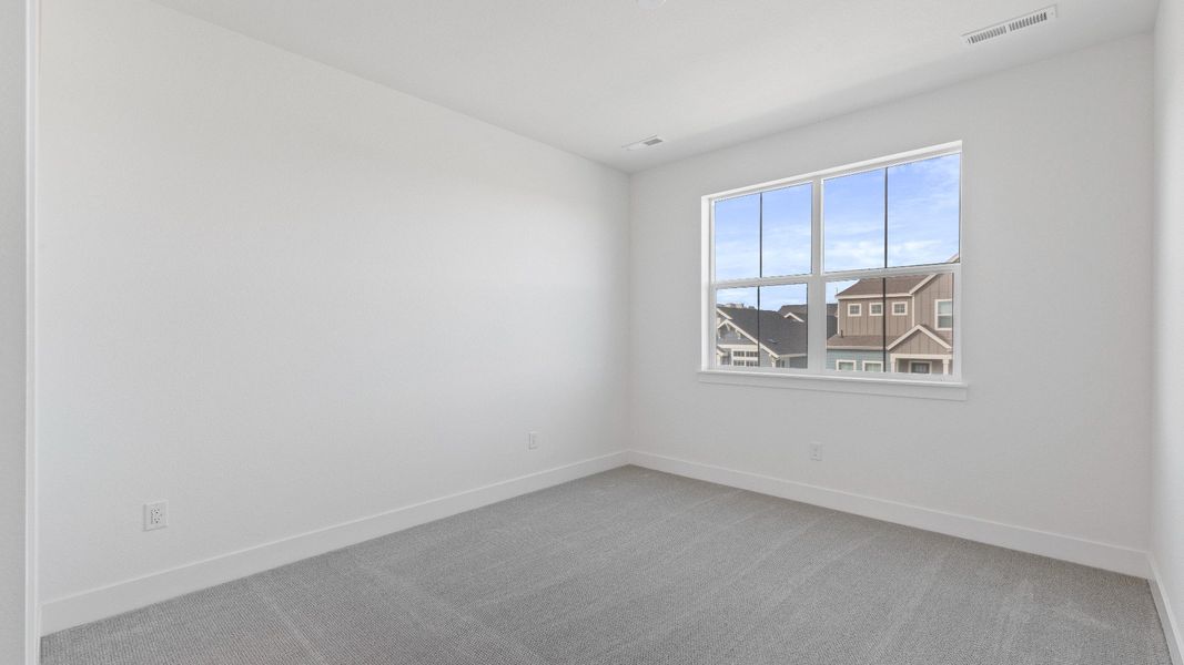 Furnished interior view inside a new home in Dillon Pointe - Journey, Broomfield (Image 26).