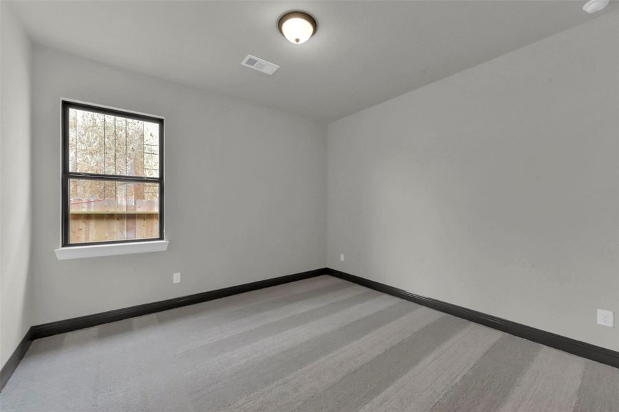 Spacious, unfurnished interior of a new home in Evergreen 55', Conroe (Image 32).
