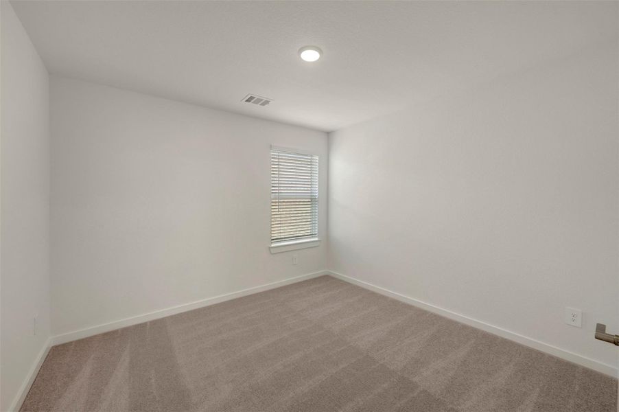 Spacious, unfurnished interior of a new home in Wildrye, Waller (Image 29).