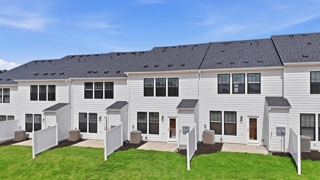 Warm and inviting outdoor living space with a spacious patio and tasteful finishes located in Simpsonville, SC