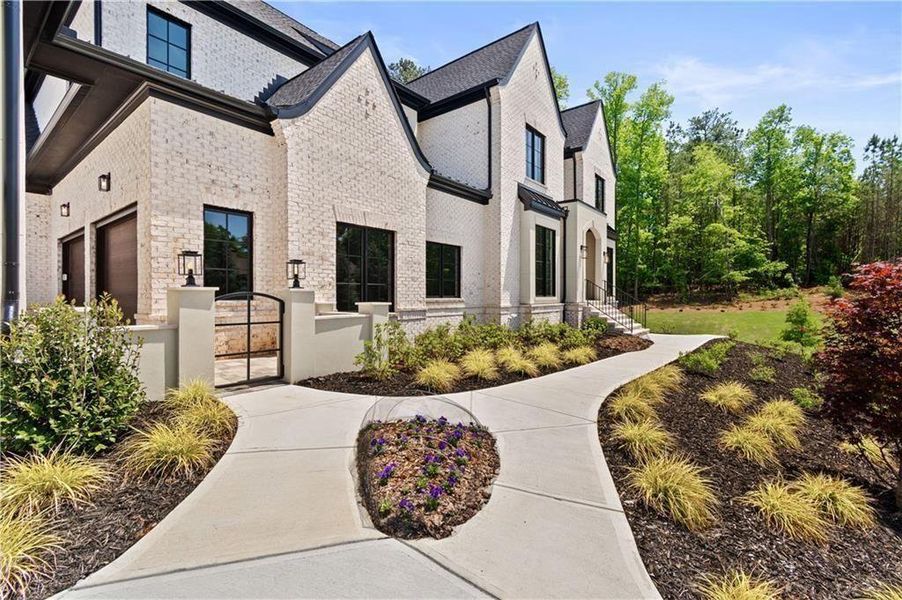 Front exterior of a new home in , Alpharetta, GA, highlighting curb appeal (Image 32).
