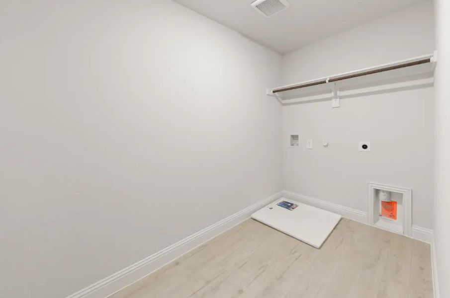 Front exterior of a new home in Sereno Oaks at Buckner Terrace, Dallas, TX, highlighting curb appeal (Image 5).