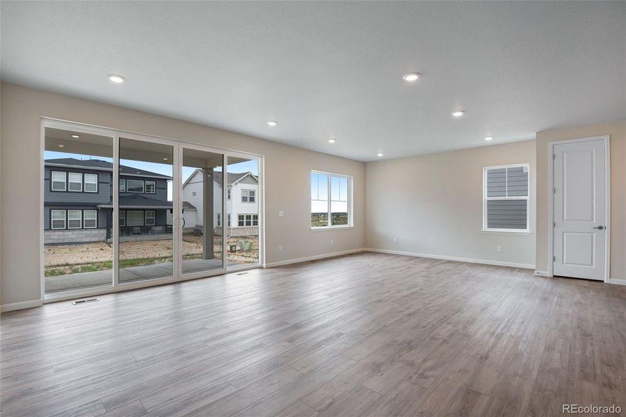 Spacious, unfurnished interior of a new home in Ensemble at The Aurora Highlands, Aurora (Image 37).