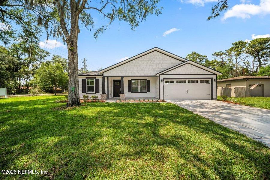 Front exterior of a new home in , Jacksonville, FL, highlighting curb appeal (Image 24).