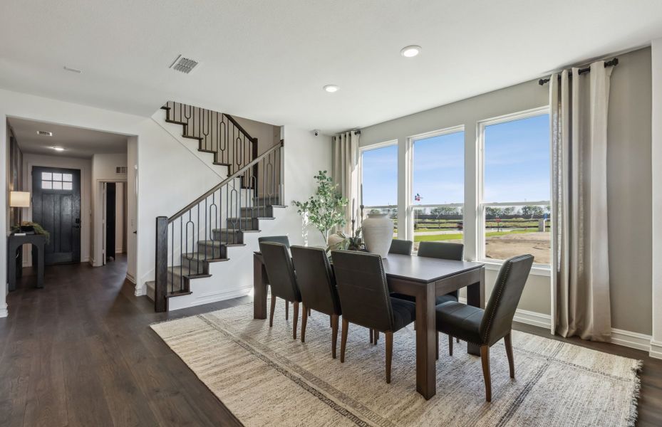 Dining area with view of kitchen and gathering room