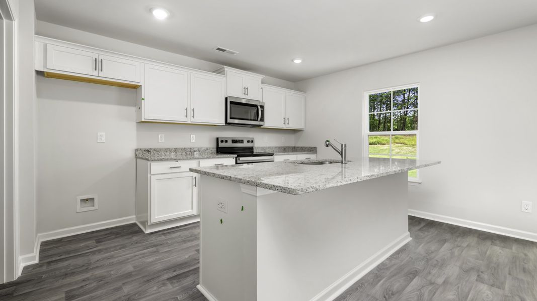 Furnished interior view inside a new home in Greystone North, Stoneville (Image 4).