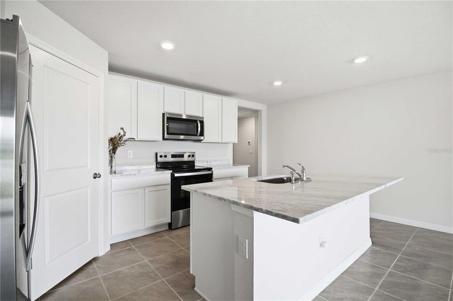 Furnished interior view inside a new home in Mandarin Grove, Palmetto (Image 9).