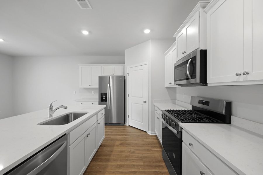 Furnished interior view inside a new home in Pineview North, Summerville (Image 9).
