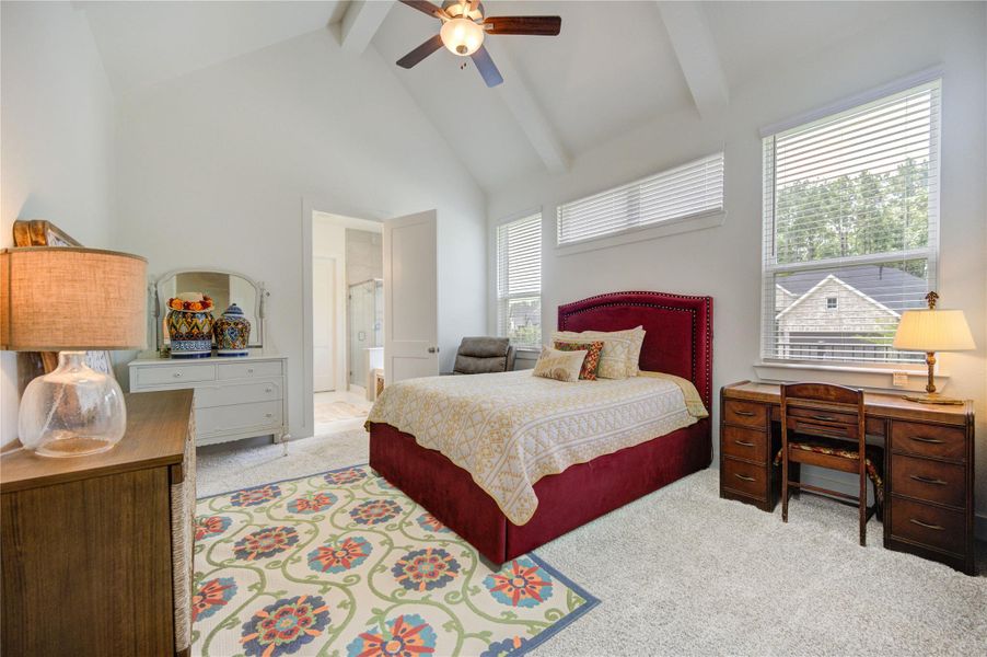 Escape to the spacious primary suite featuring high ceilings and plenty of room to relax. Escape to the spacious primary suite featuring high ceilings and plenty of room to relax.
