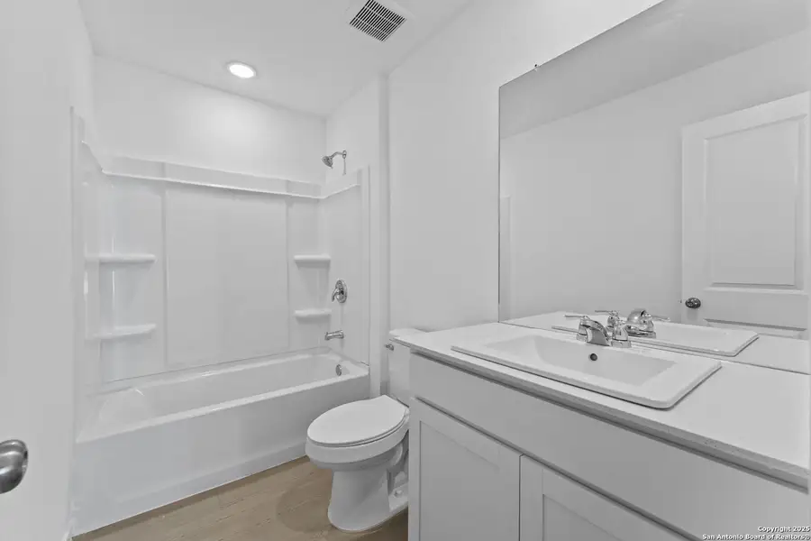 Furnished interior view inside a new home in Randolph Crossing: Cottage Collection, Converse (Image 8).
