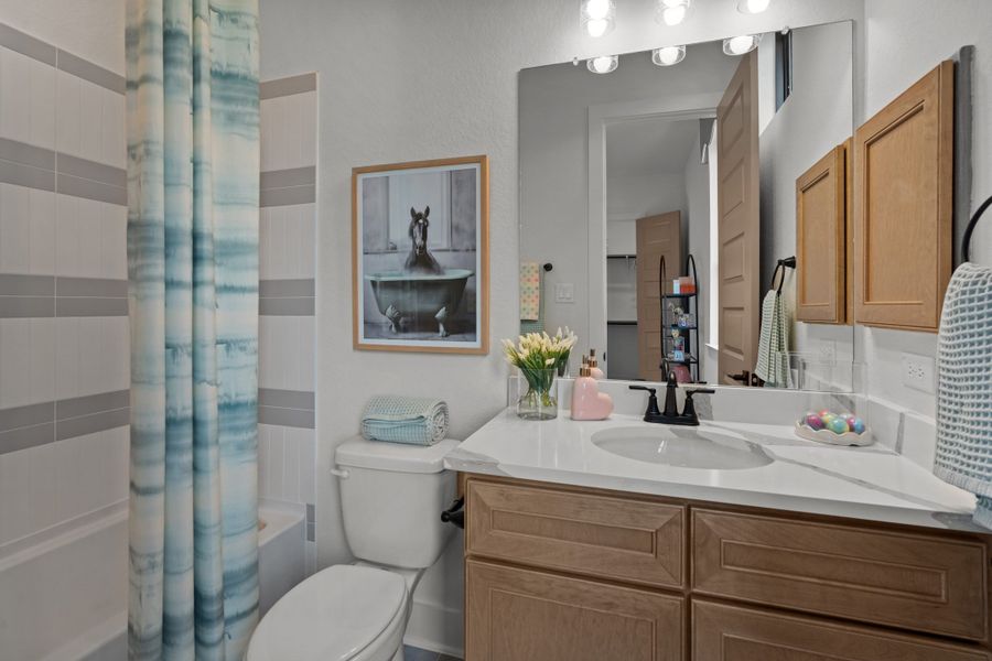 Furnished interior view inside a new home in Caliza Reserve, Boerne (Image 35).