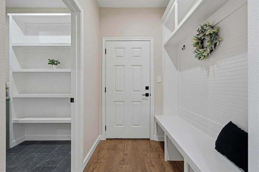 Mud room off garage entry across from the laundry/utility room